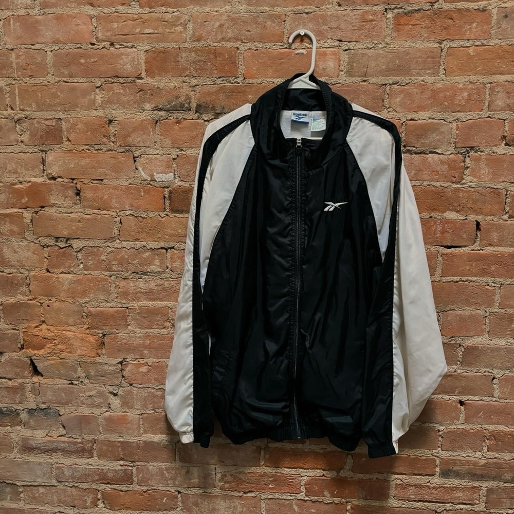 $40 Vintage 90s Reebok black and white windbreaker jacket